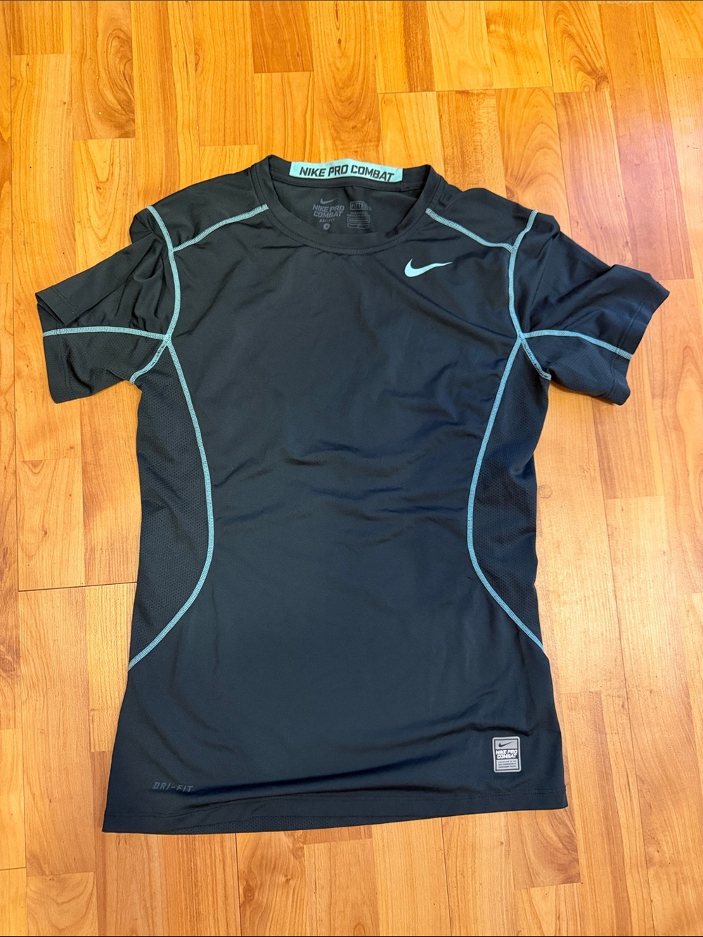 Nike Black Short-Sleeve Performance Tee with Teal Piping